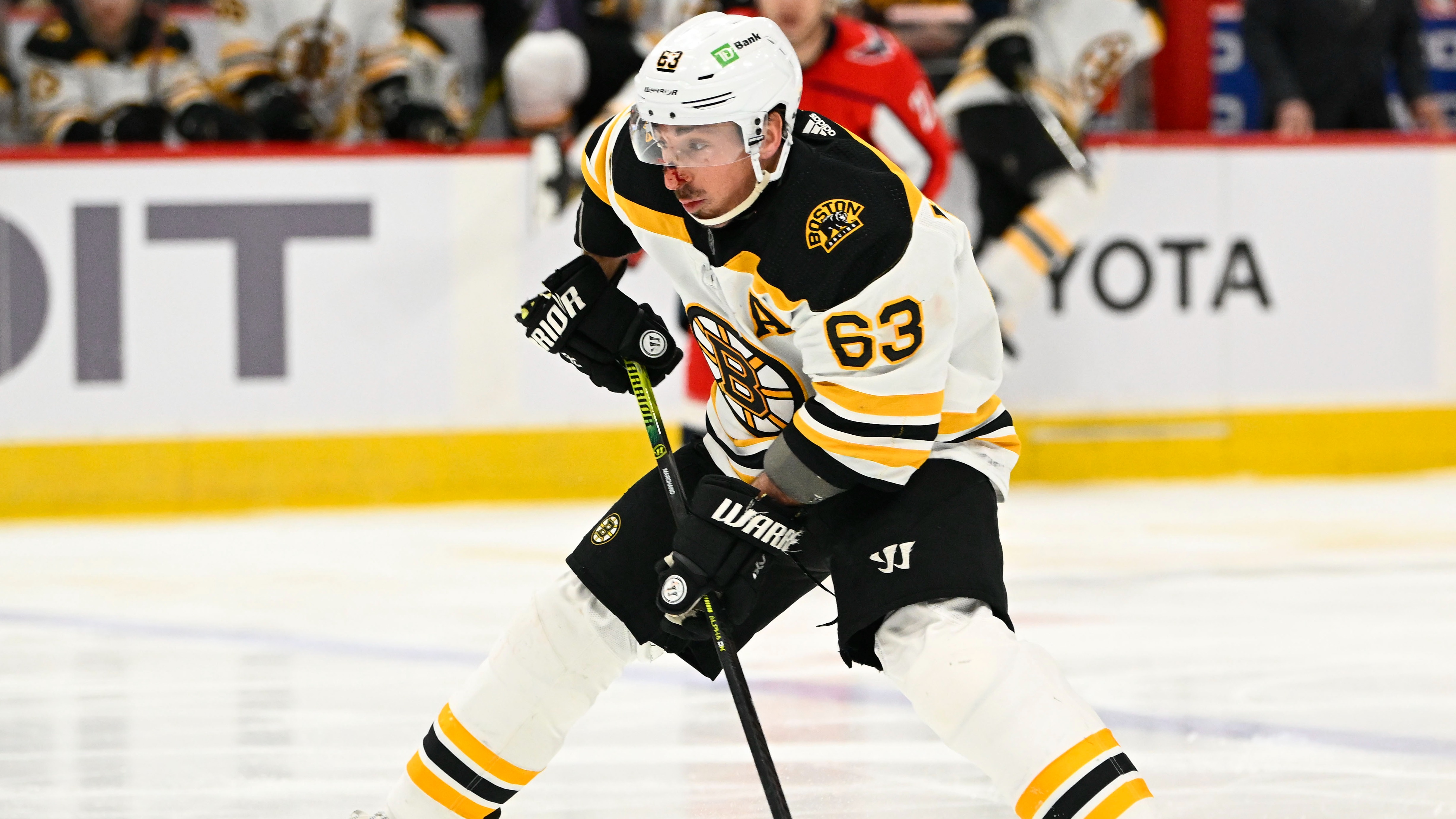 Marchand scorer hat-trick